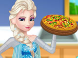 Беременная Эльза готовит пиццу